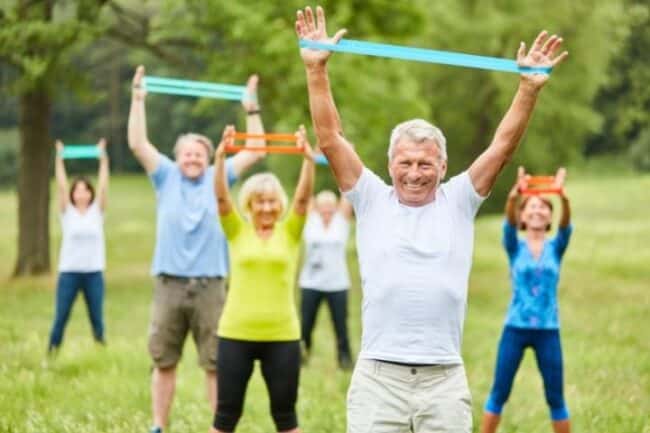 Strength exercise using resistance bands for elderly over 50s.